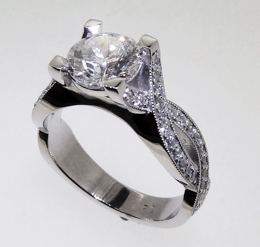 round diamond twist engagement ring