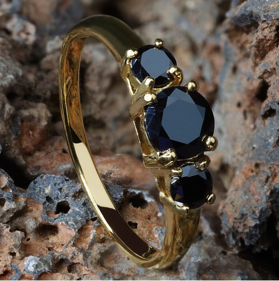 black cubic zirconia engagement ring in gold setting
