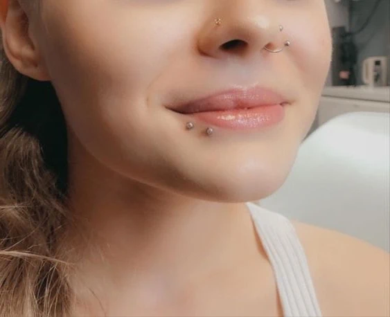 spider bites lip piercing