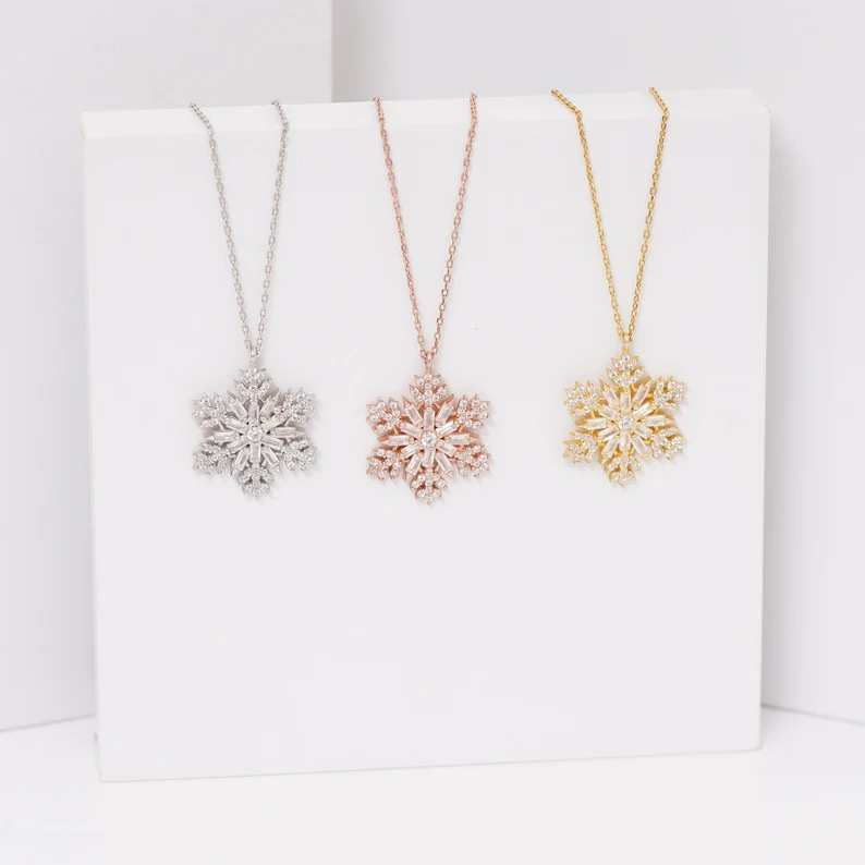 snowflake necklace in silver, rose gold and yellow gold tones