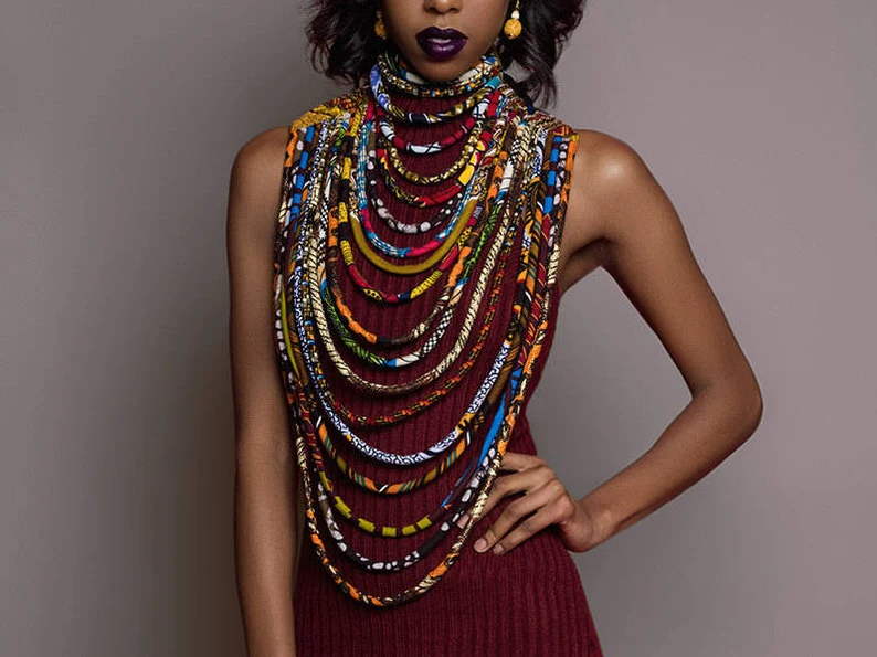 ankara print african necklace on the woman's neck