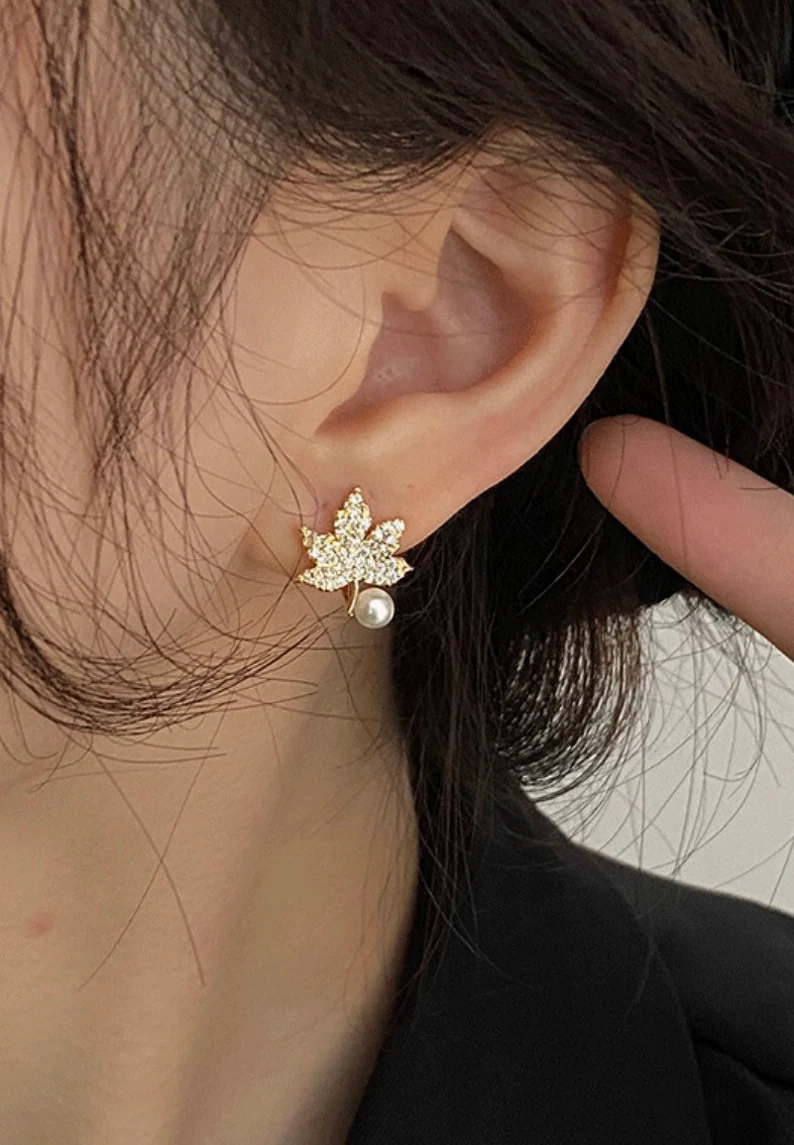 maple leaf and pearl design clip-on earrings