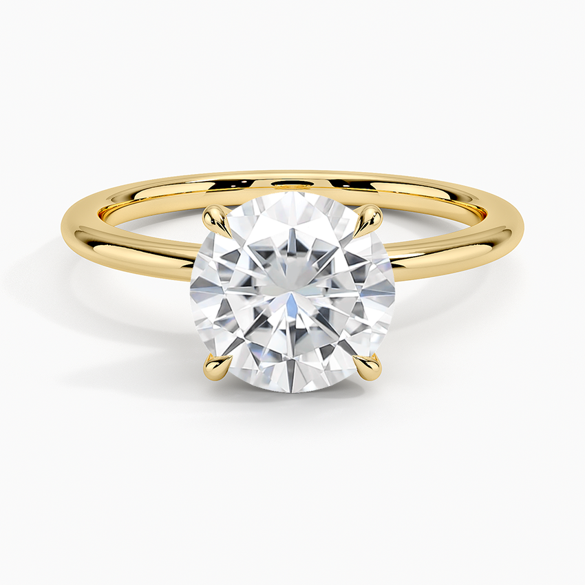 gold moissanite solitaire ring