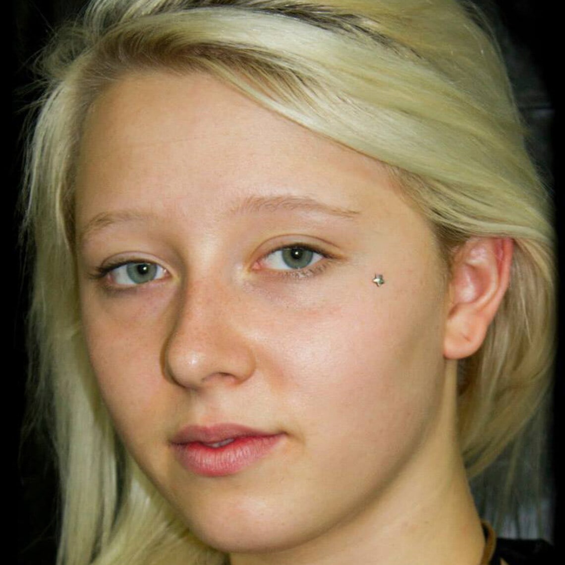 star shaped tops on the woman's dermal piercing