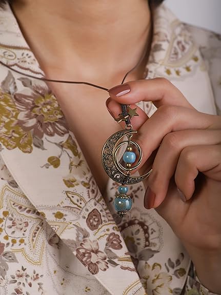 a woman wearing bohemian style moon stars necklace