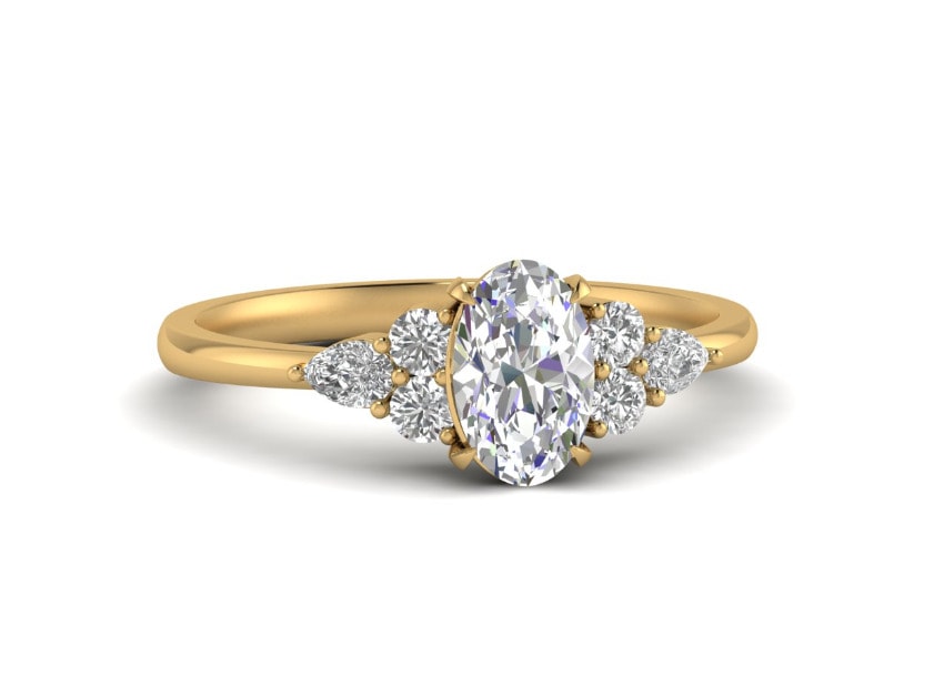 oval cut diamond with pear shape diamond accent enaggement ring