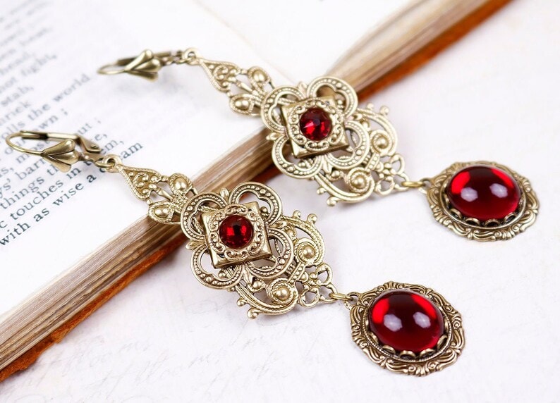 garnet tudor earrings with gemstones
