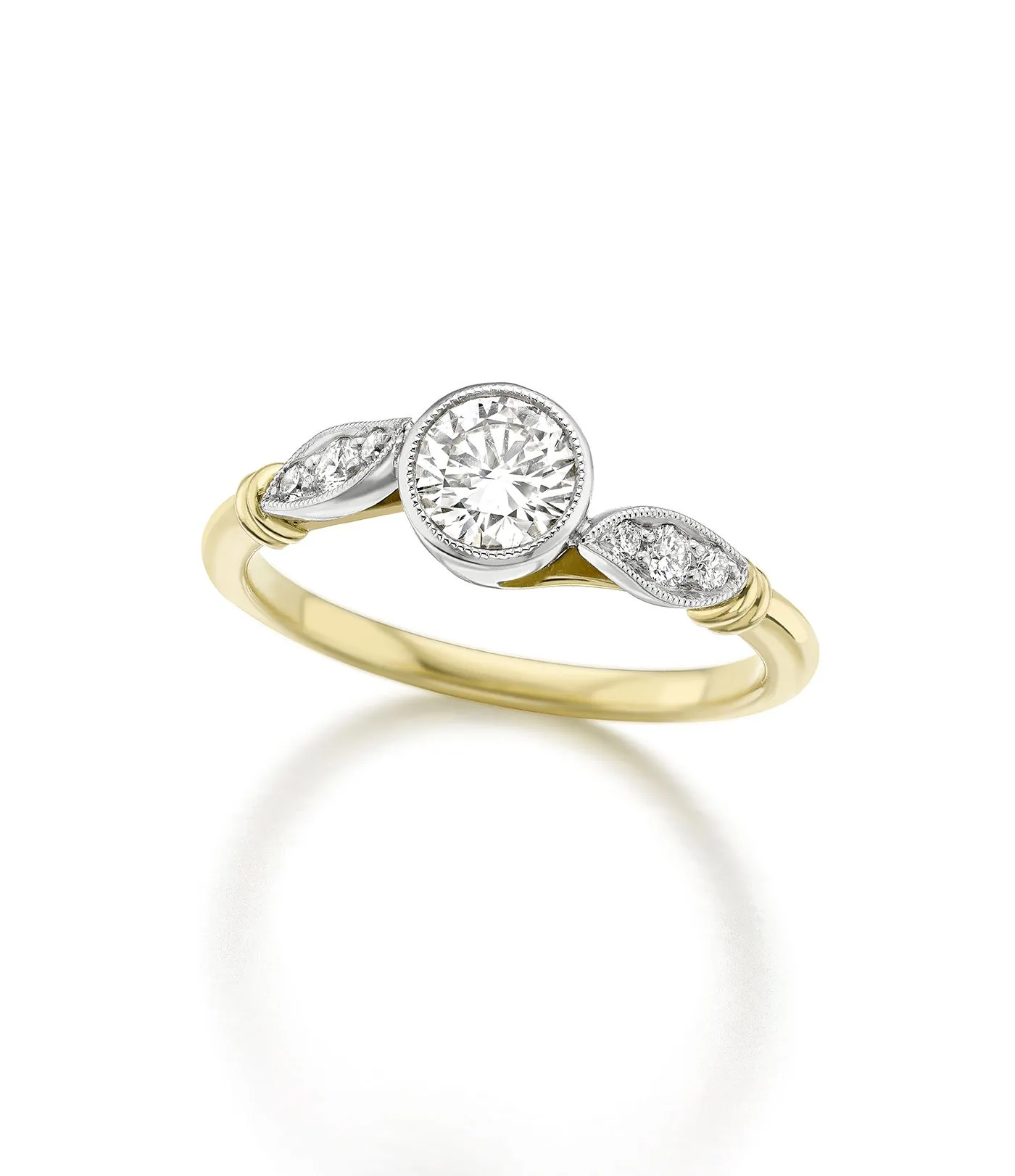 round cut diamond with milgrain engagaement ring