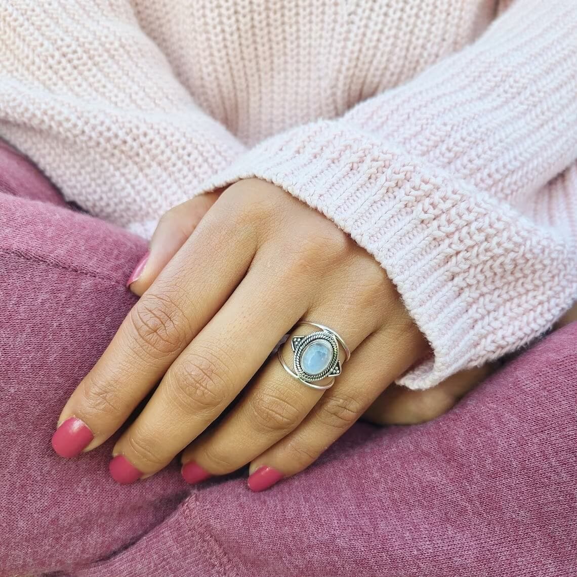moonstone boho ring on the woman's finger
