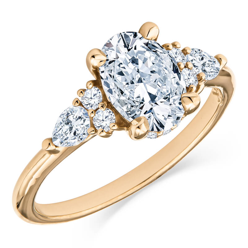 Oval brilliant cut diamond engagement ring in yellow gold setting