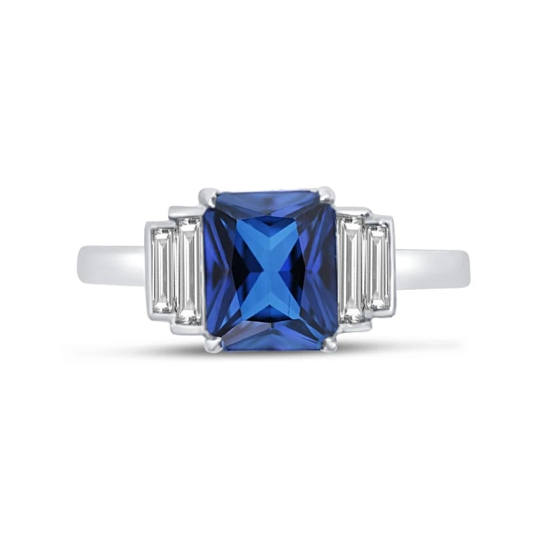 blue sapphire emerald diamond and baguettes engagement ring