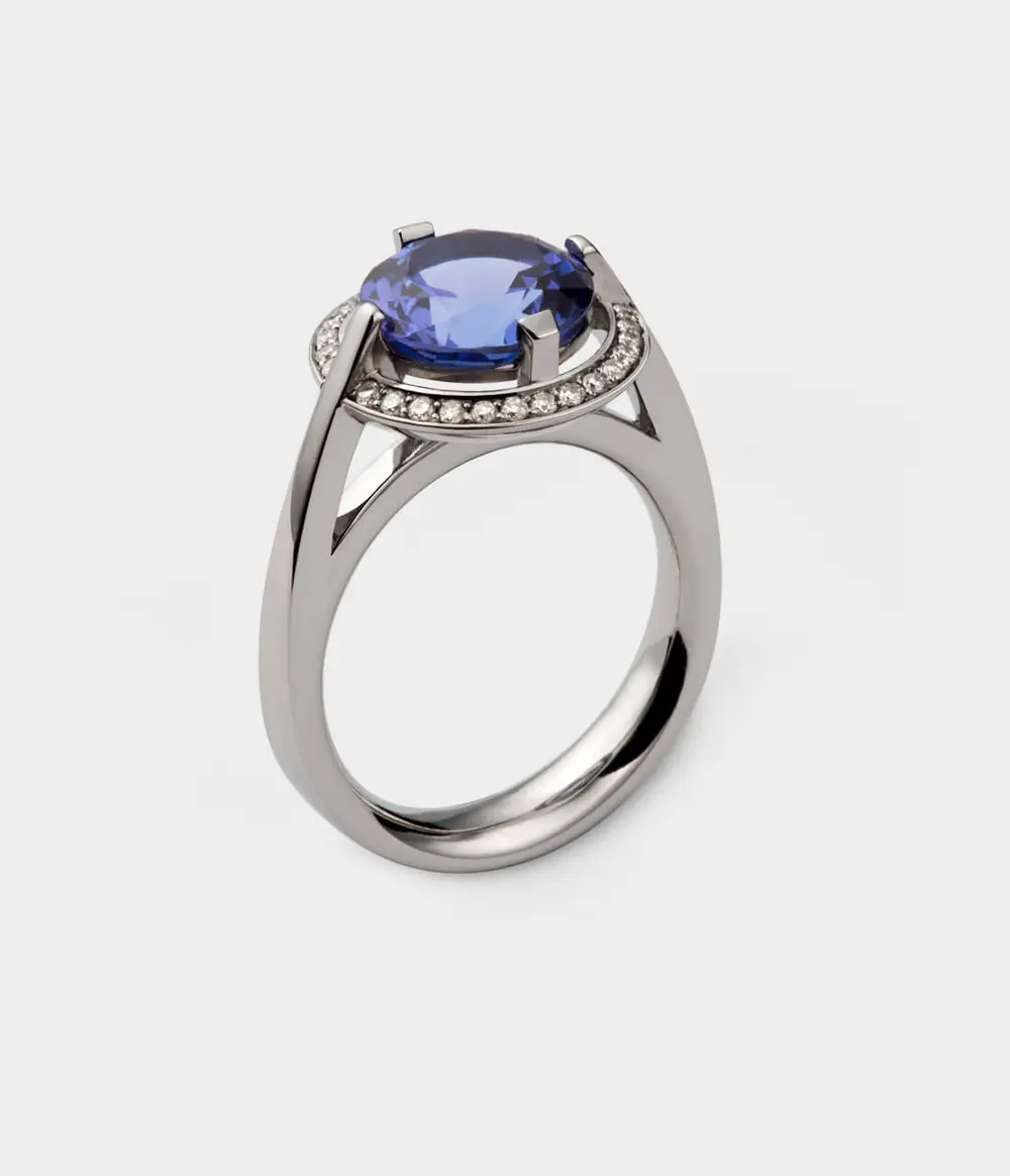 brilliant cut tanzanite halo engagement ring