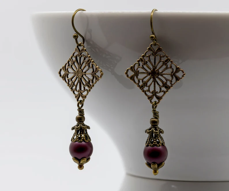 tudor rose style earrings