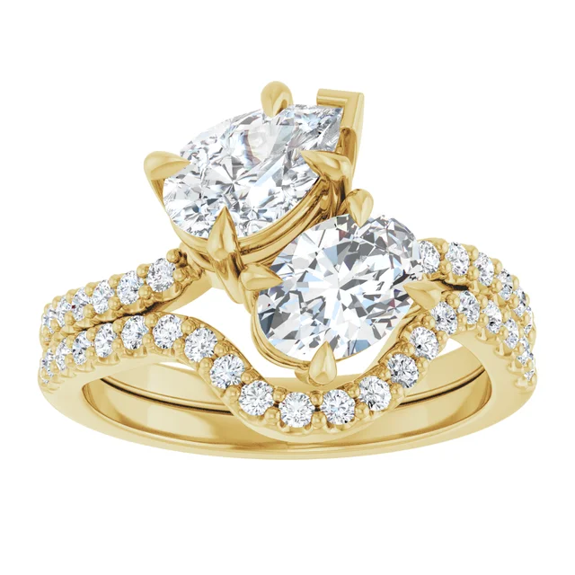 two stone pear diamond engagement ring in yellow gold setting